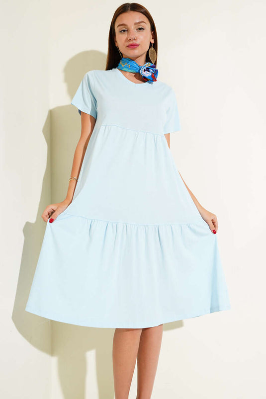 فستان سوبريم بياقة على شكل حرف V، لون أزرق فاتح