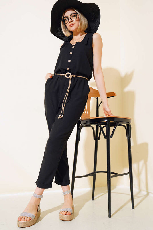 Træknappet linned jumpsuit sort