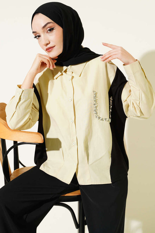 Camicia beige con dettagli in pietra e rifiniture
