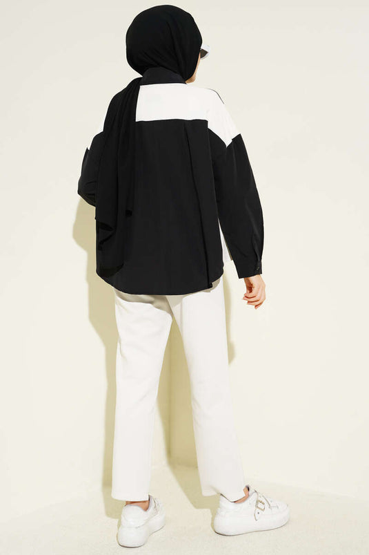 Chemise noire avec détails en pierre et garniture