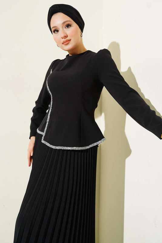Ensemble deux pièces noir à jupe plissée ornée de pierres