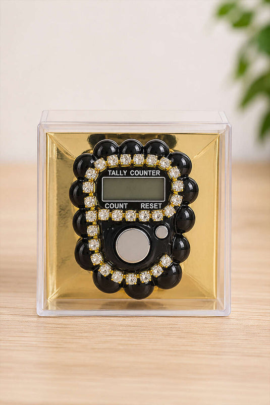Chapelet à perles et pierres noires