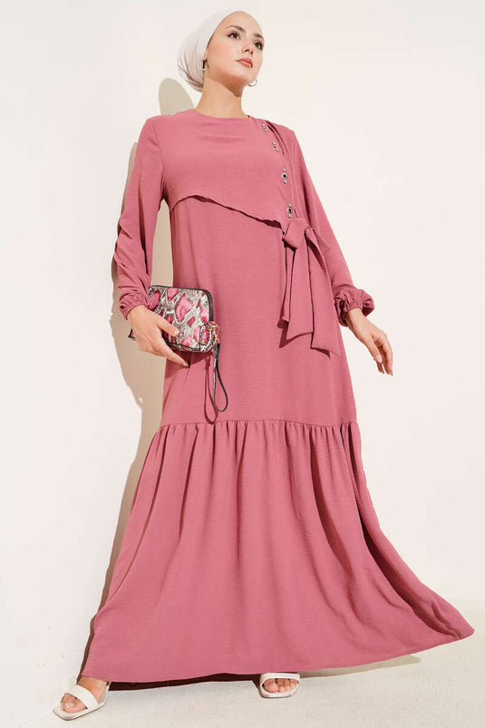 فستان مربوط بتفاصيل عين الطائر، لون وردي باهت