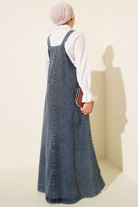 فستان دنيم بحمالات وجيب واحد باللون الأزرق الفاتح