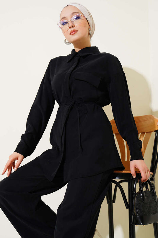 بدلة تنسل من قطعتين بجيب واحد باللون الأسود
