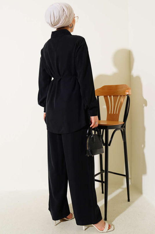 بدلة تنسل من قطعتين بجيب واحد باللون الأسود