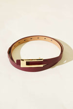 Ceinture à boucle métallique bordeaux
