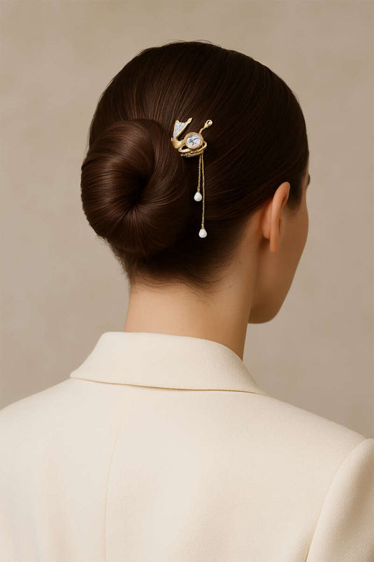 Stylo à bouton doré