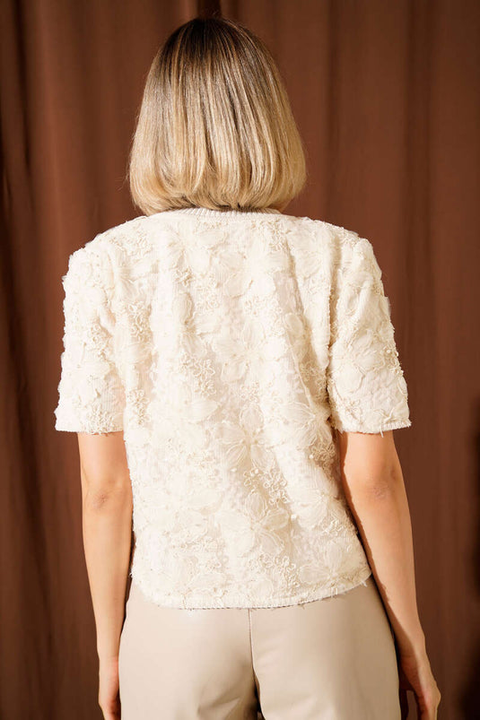 Cárdigan corto de punto con botones y flores de tul, beige