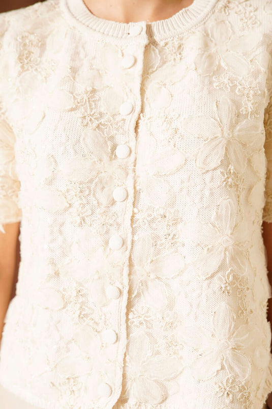 Cárdigan corto de punto con botones y flores de tul, beige