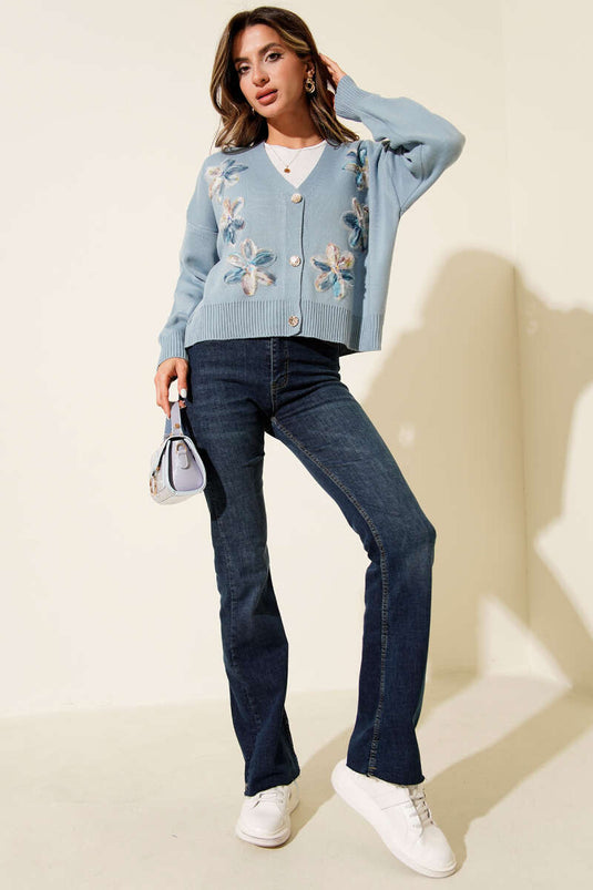 Cardigan corto in maglia con bottoni a forma di fiore in tulle indaco