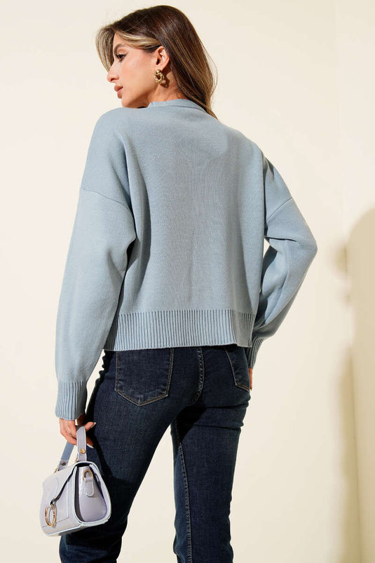 Cardigan corto in maglia con bottoni a forma di fiore in tulle indaco