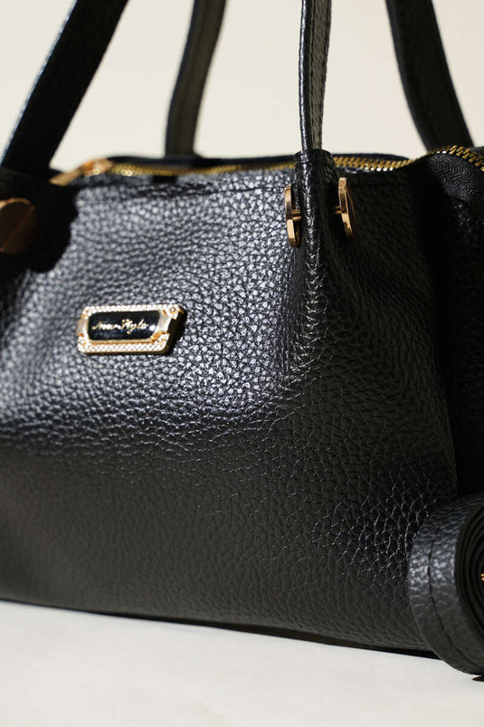 Sac à trois compartiments noir avec emblème