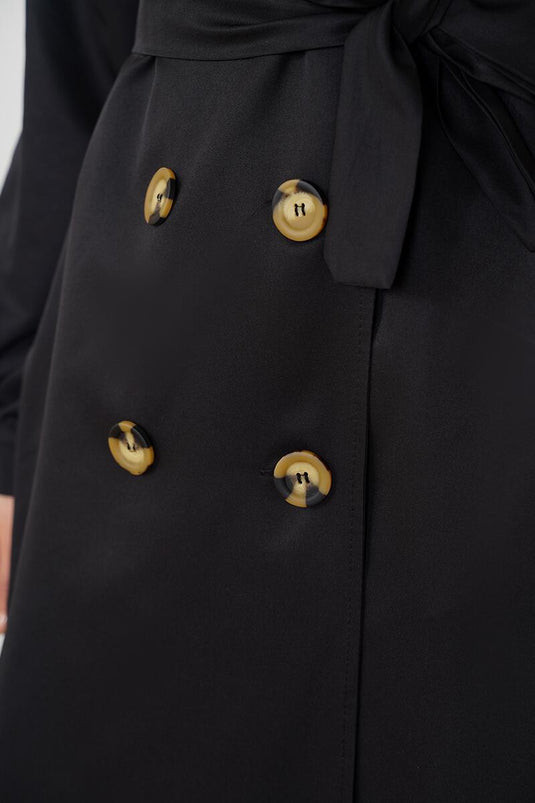 Trench-coat noir à col double boutonnage à trois boutons