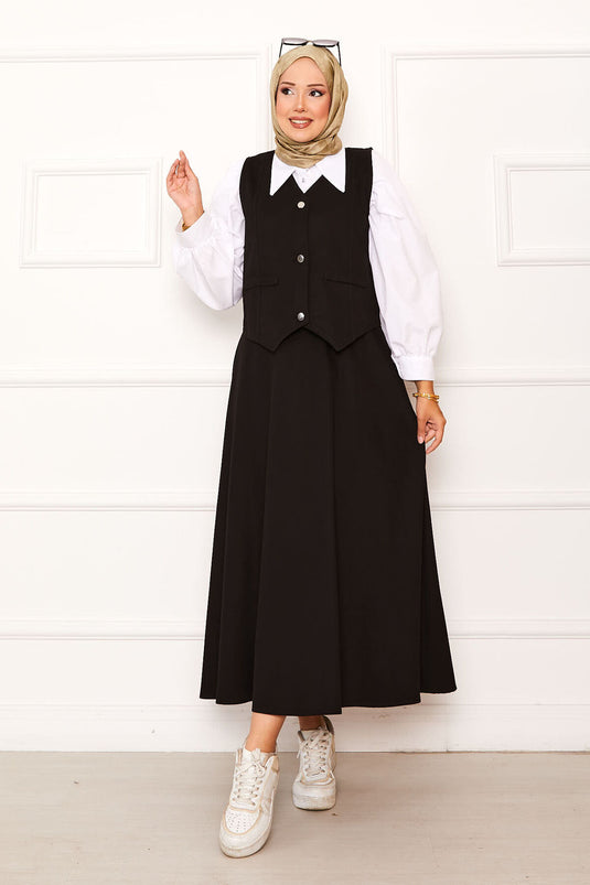 بدلة سوداء من قطعتين، سترة وتنورة بثلاثة أزرار
