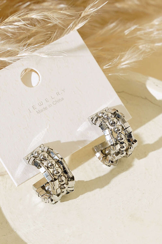 أقراط فضية بثلاثة صفوف