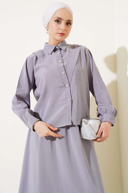 Ensemble deux pièces gris à jupe et découpe en V