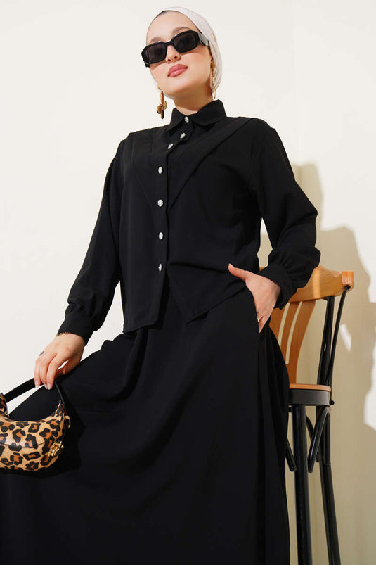 Ensemble deux pièces noir à jupe et coutures en V