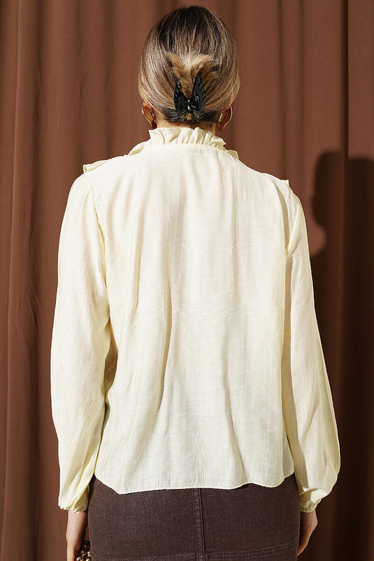 Blusa a righe con volant e scollo a V giallo