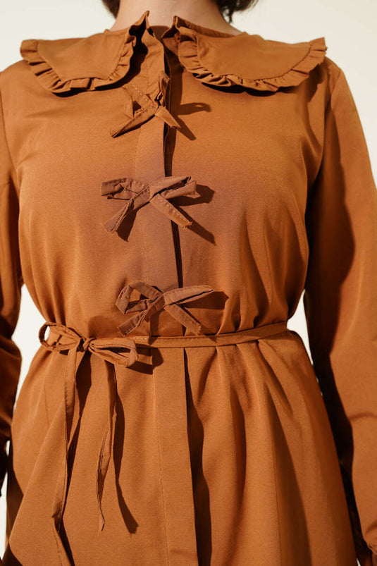 Tunique à col volanté et nœud beige