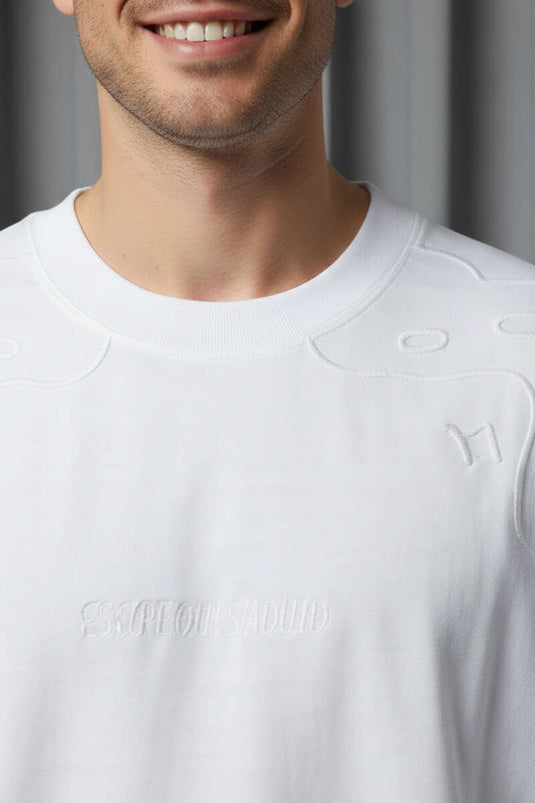 T-shirt oversize homme à manches raglan brodées blanc