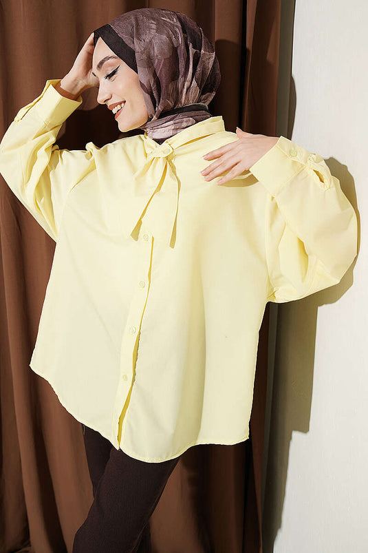 Camicia ampia con collo allacciato giallo