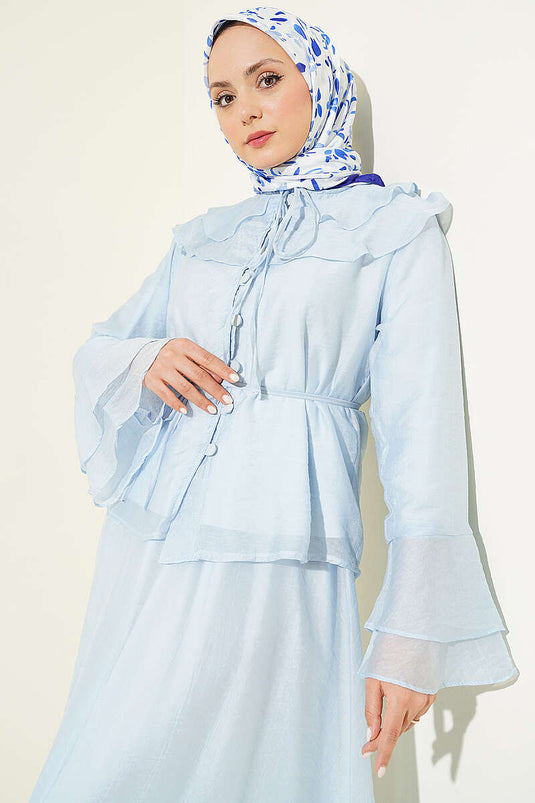 Ensemble jupe boutonnée bleu avec col à volants en tissu brit