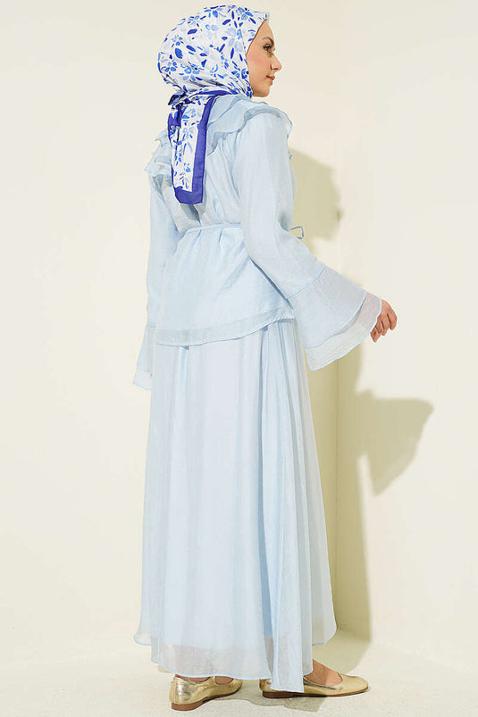 Ensemble jupe boutonnée bleu avec col à volants en tissu brit