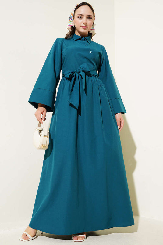 Robe boutonnée croisée à nouer sur le côté, bleu pétrole