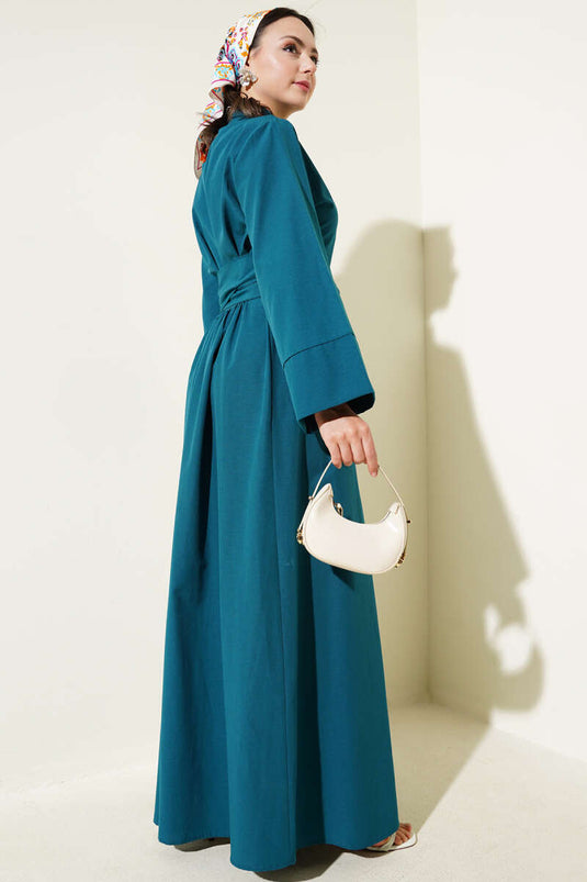 Robe boutonnée croisée à nouer sur le côté, bleu pétrole