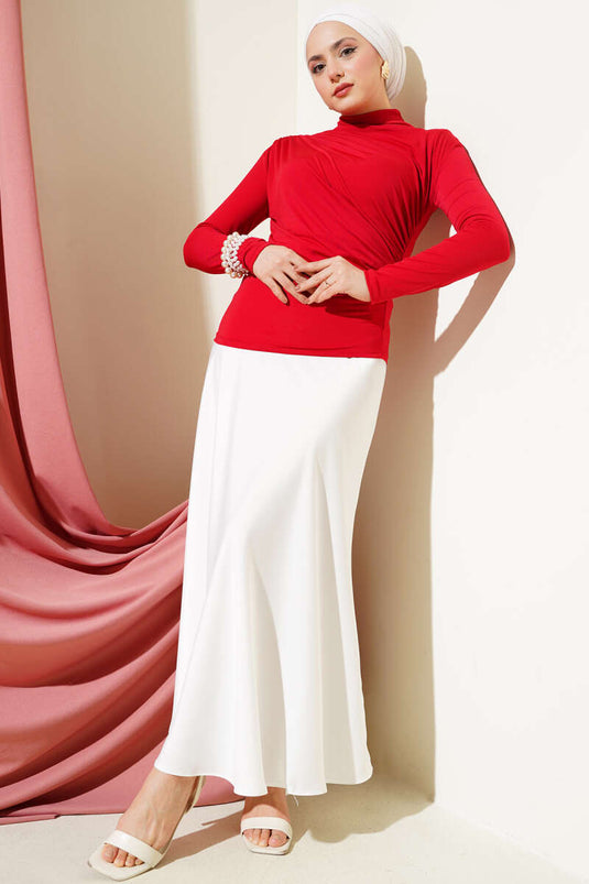 Chemisier rouge Sandy à col roulé froncé sur le côté