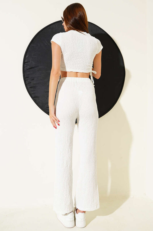 Tweedelige witte crop top met wafelpatroon en zijplooien