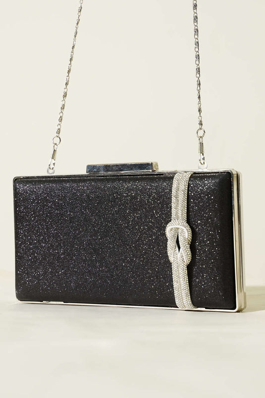 Sac de soirée noir avec détail de nœud en soie Yan