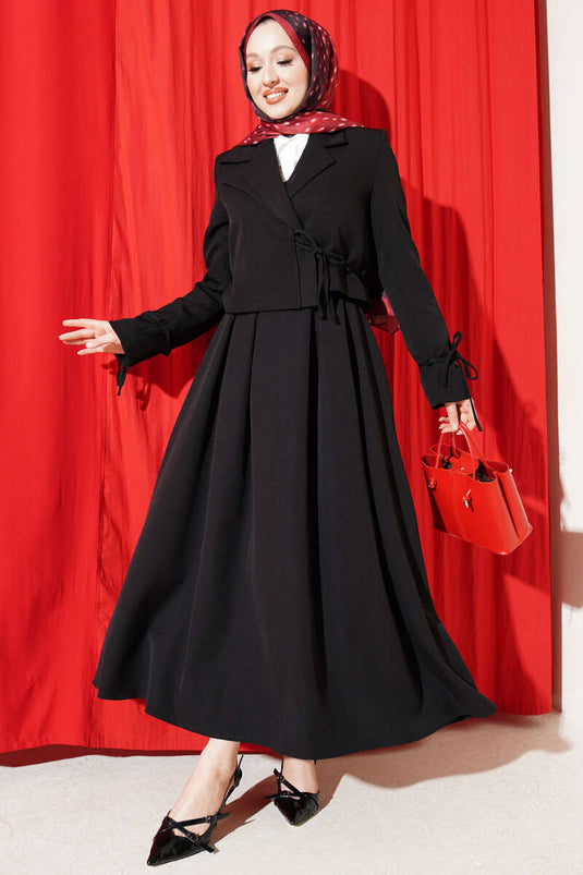 Ensemble deux pièces jupe et veste à lacets latéraux noir