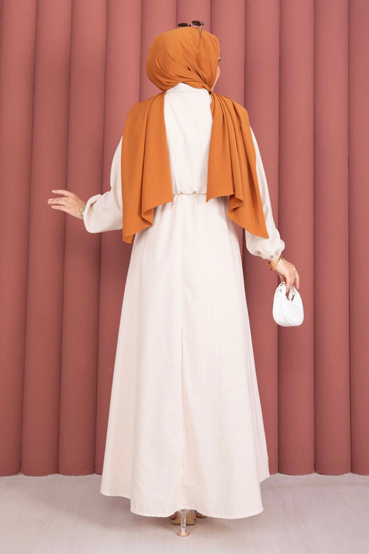 Robe modeste à rayures avec nouage latéral beige