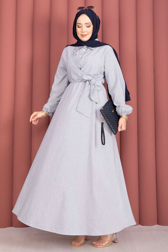 Robe modeste à rayures avec nouage latéral bleu marine
