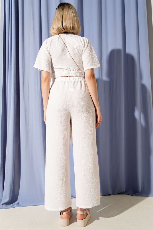 طقم قطعتين أبيض برباط جانبي