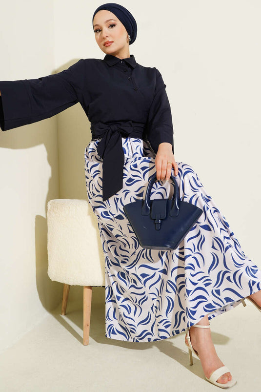 بدلة من قطعتين برباط جانبي وتنورة باللون الأزرق الداكن