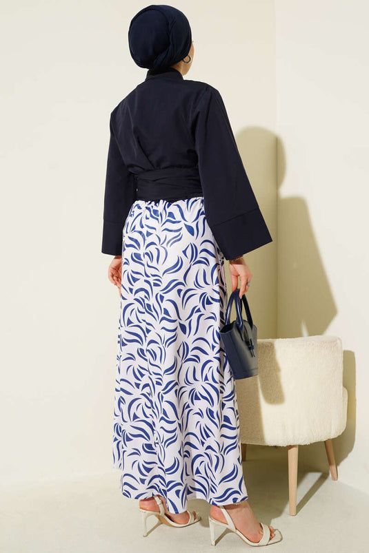 بدلة من قطعتين برباط جانبي وتنورة باللون الأزرق الداكن