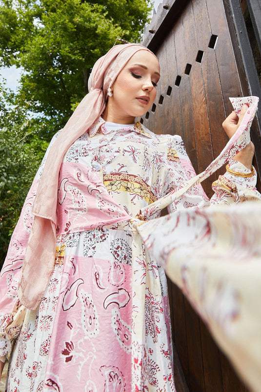 Vestido rosa con cuello camisero y lazo lateral