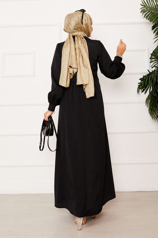 Robe chemise noire à col noué sur le côté