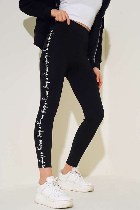 Seitlich bedruckte Leggings Schwarz