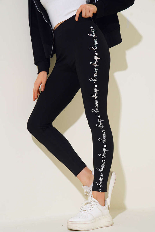 Seitlich bedruckte Leggings Schwarz