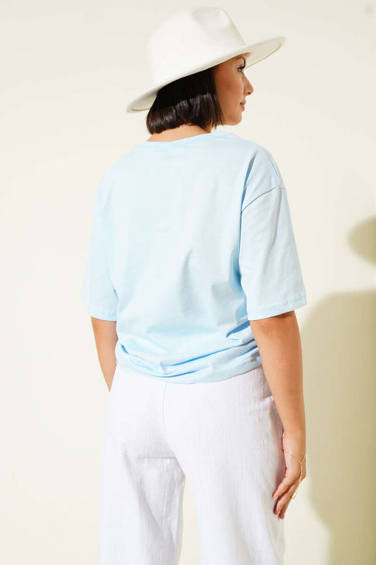 T-shirt bleu ciel avec cordons de serrage sur les côtés