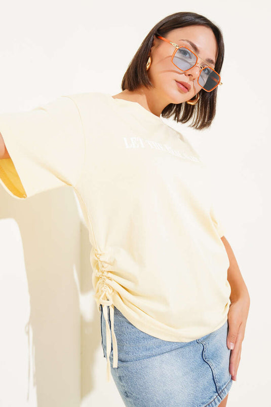 T-shirt jaune à cordons de serrage latéraux