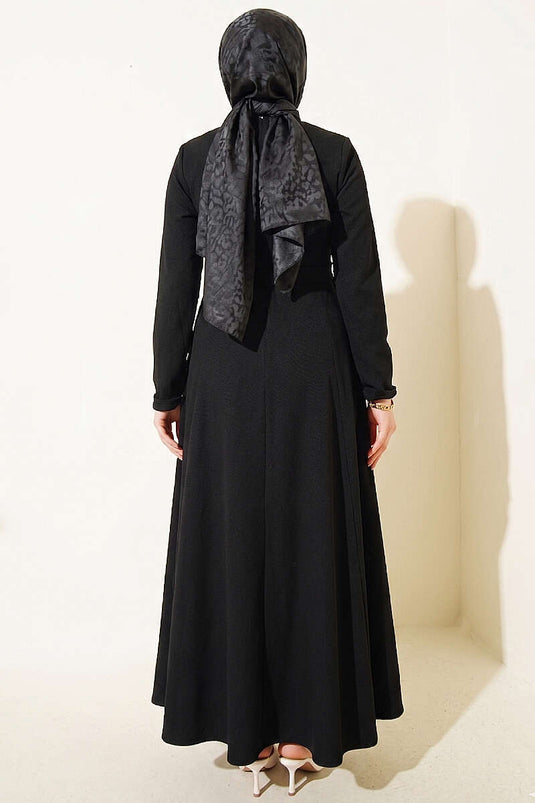 Robe plissée à pinces avec boucles sur les côtés, noire