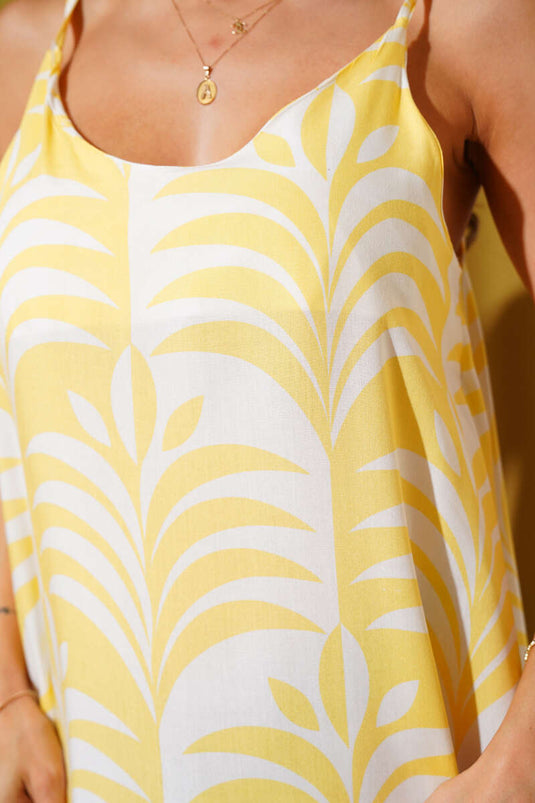 Robe midi jaune à bretelles et motif feuilles