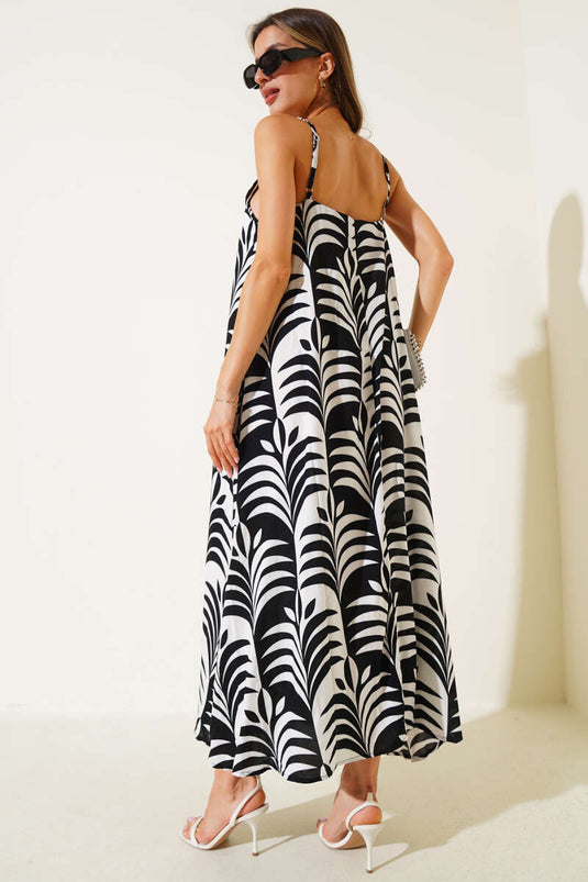Robe midi à bretelles à motif de feuilles noire