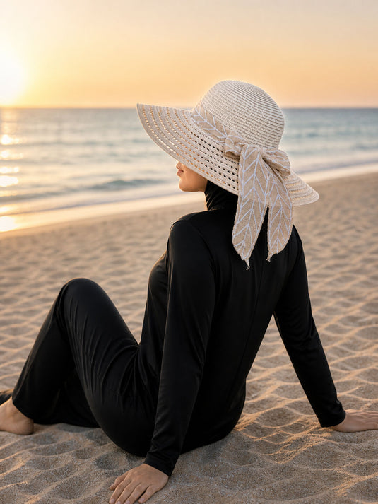 Beige Straw Hat with Leaf Pattern and Ribbon Detail
