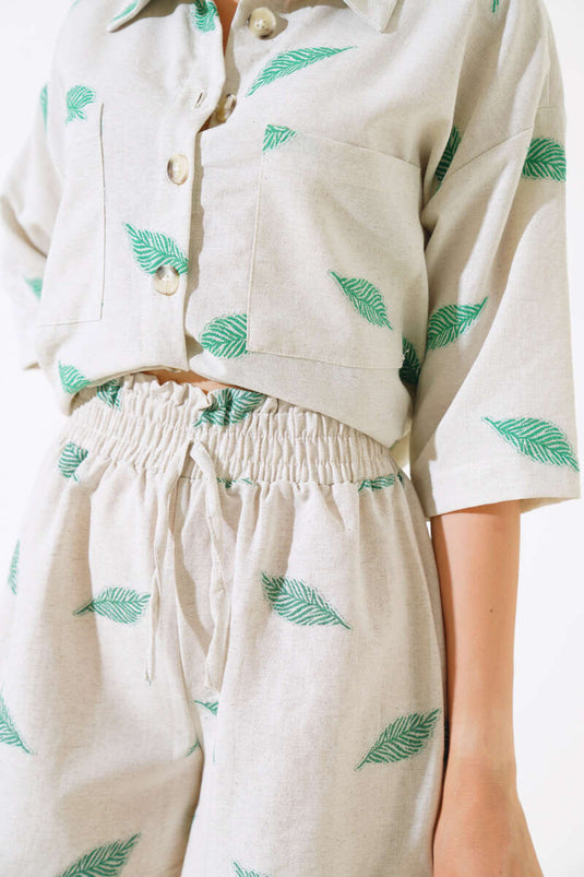 Ensemble deux pièces à motif de feuilles avec short vert
